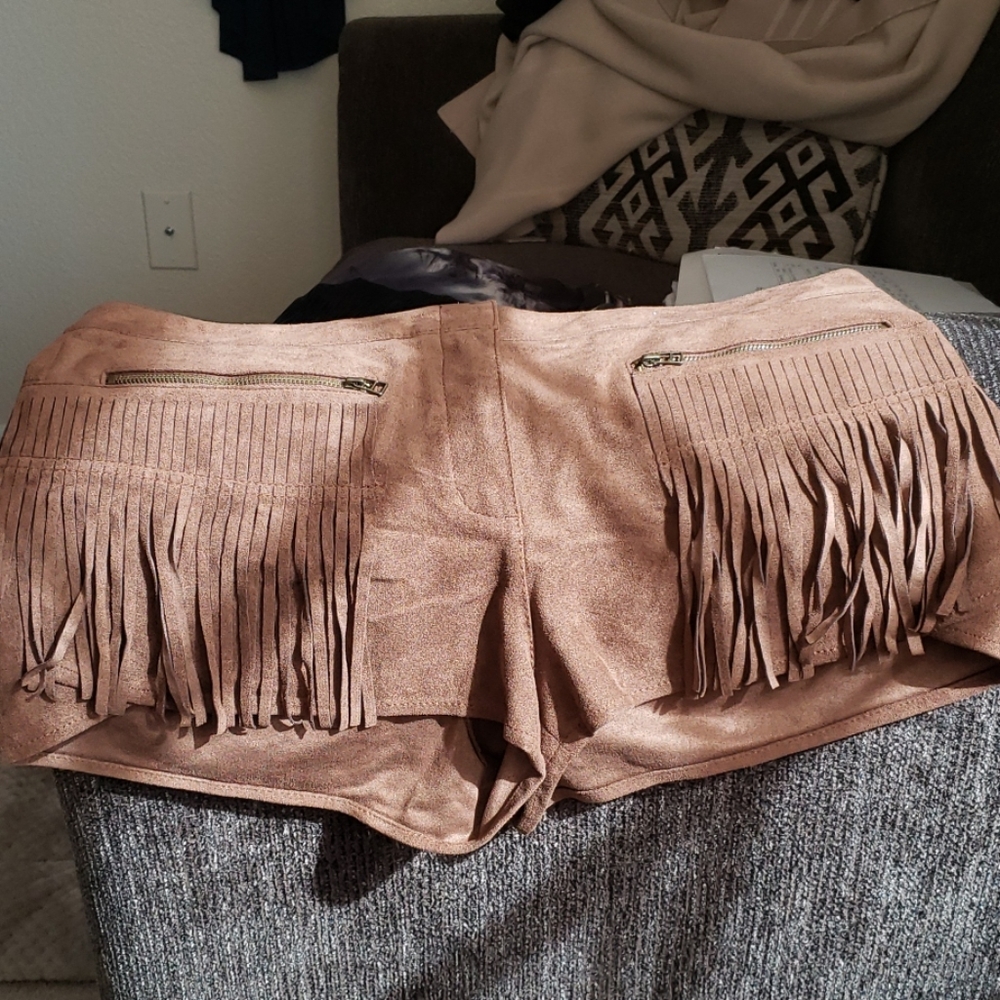 Brown suede shorts.